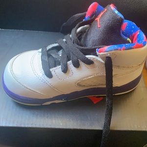 A pair of toddler girl Jordan sneakers.